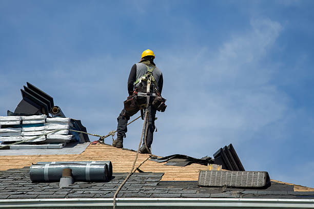 Professional Roof Replacement technician working in Bringhurst, IN